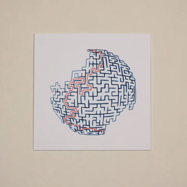 A third sphere with larger areas missing at the top left and bottom right.